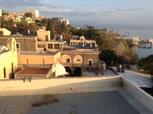 Worshippers on rooftop across from our hotel window.